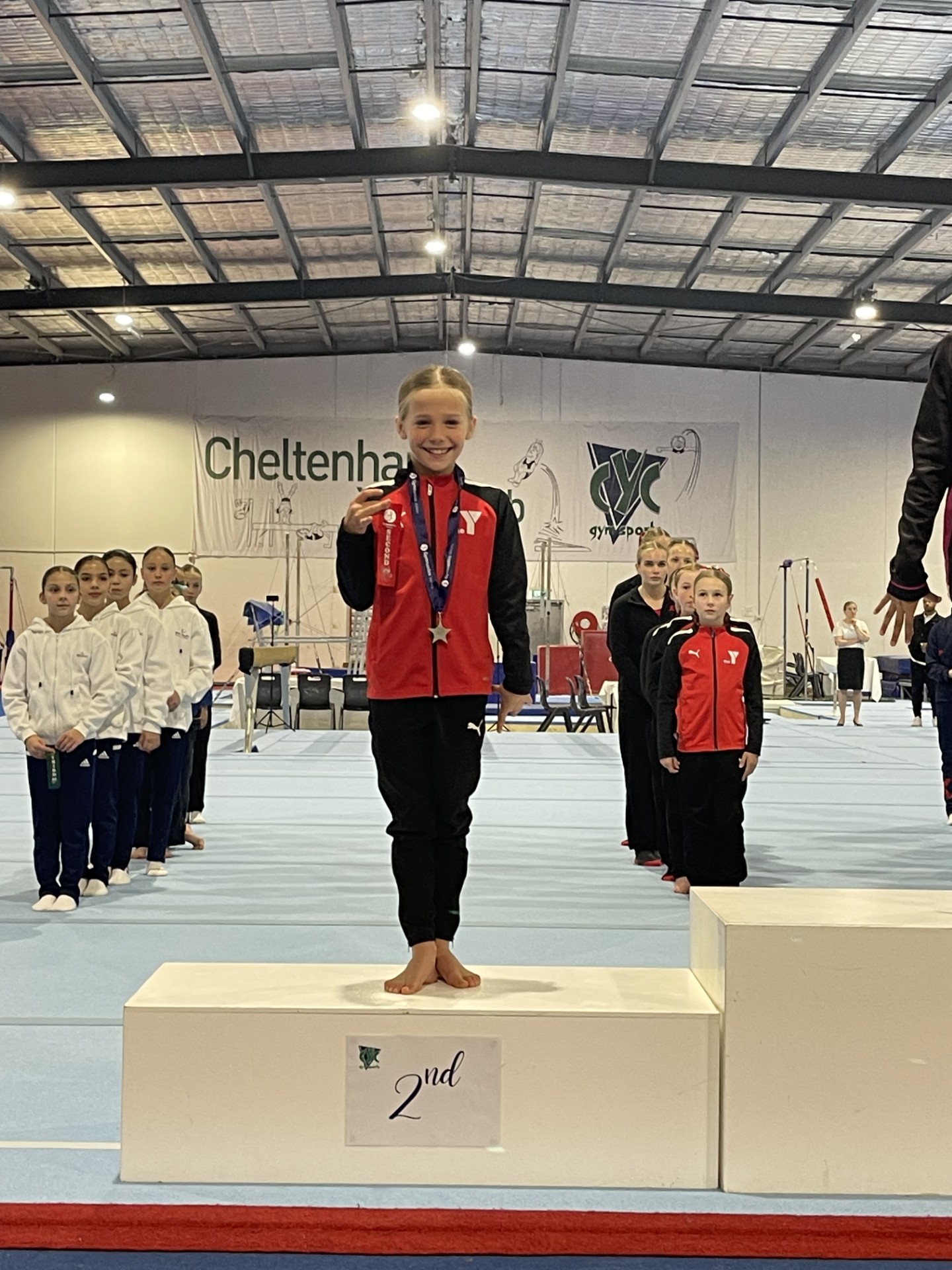 Geelong YMCA athlete on the second-place podium