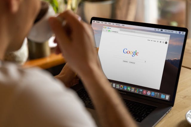 Person researching on a laptop