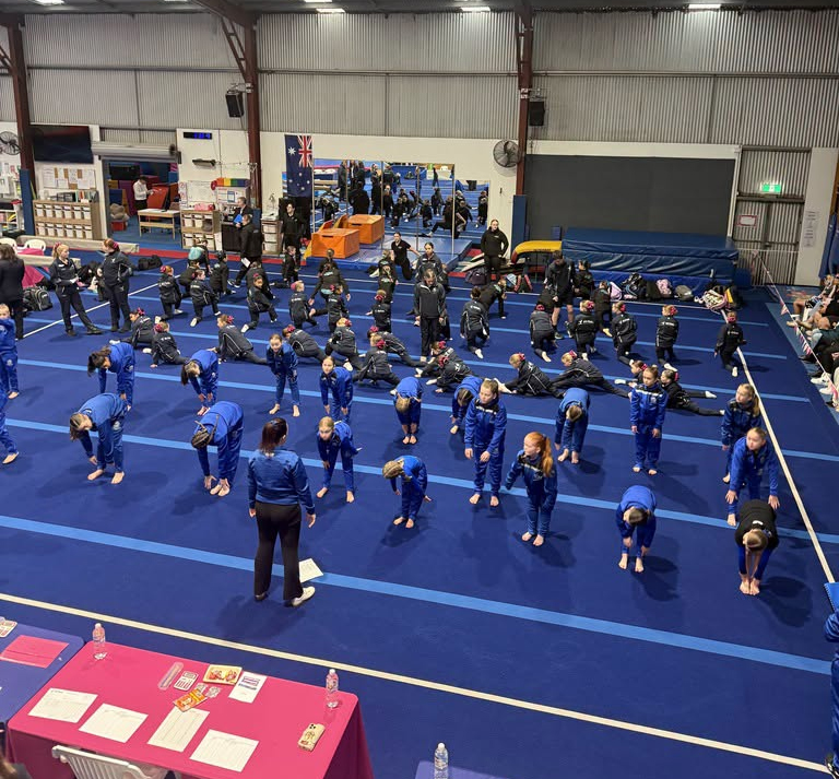 Teams warming up on the floor ahead of the 2026 Warrnambool Invite